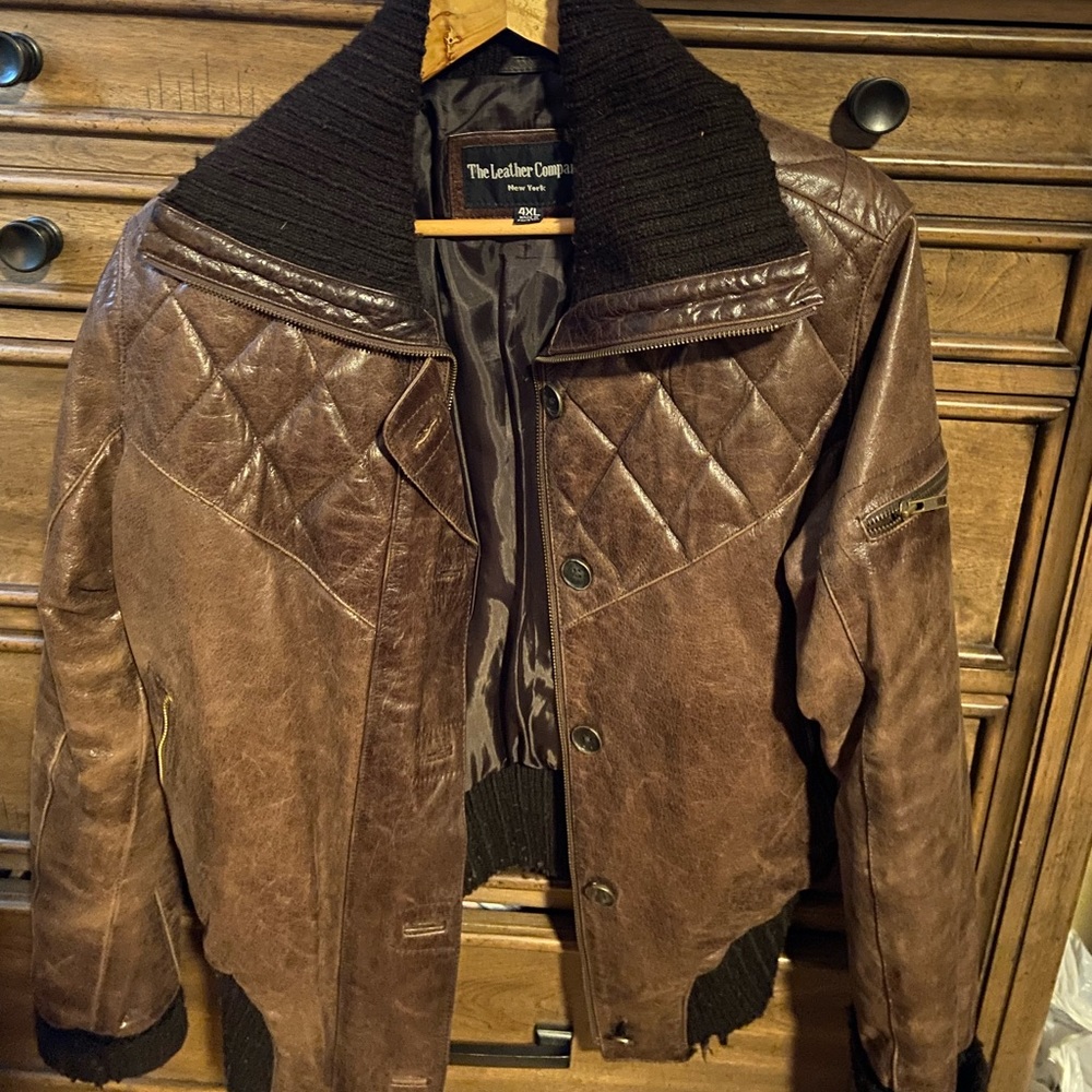 Womans brown leather jacket with sweater collar sleeve in waist